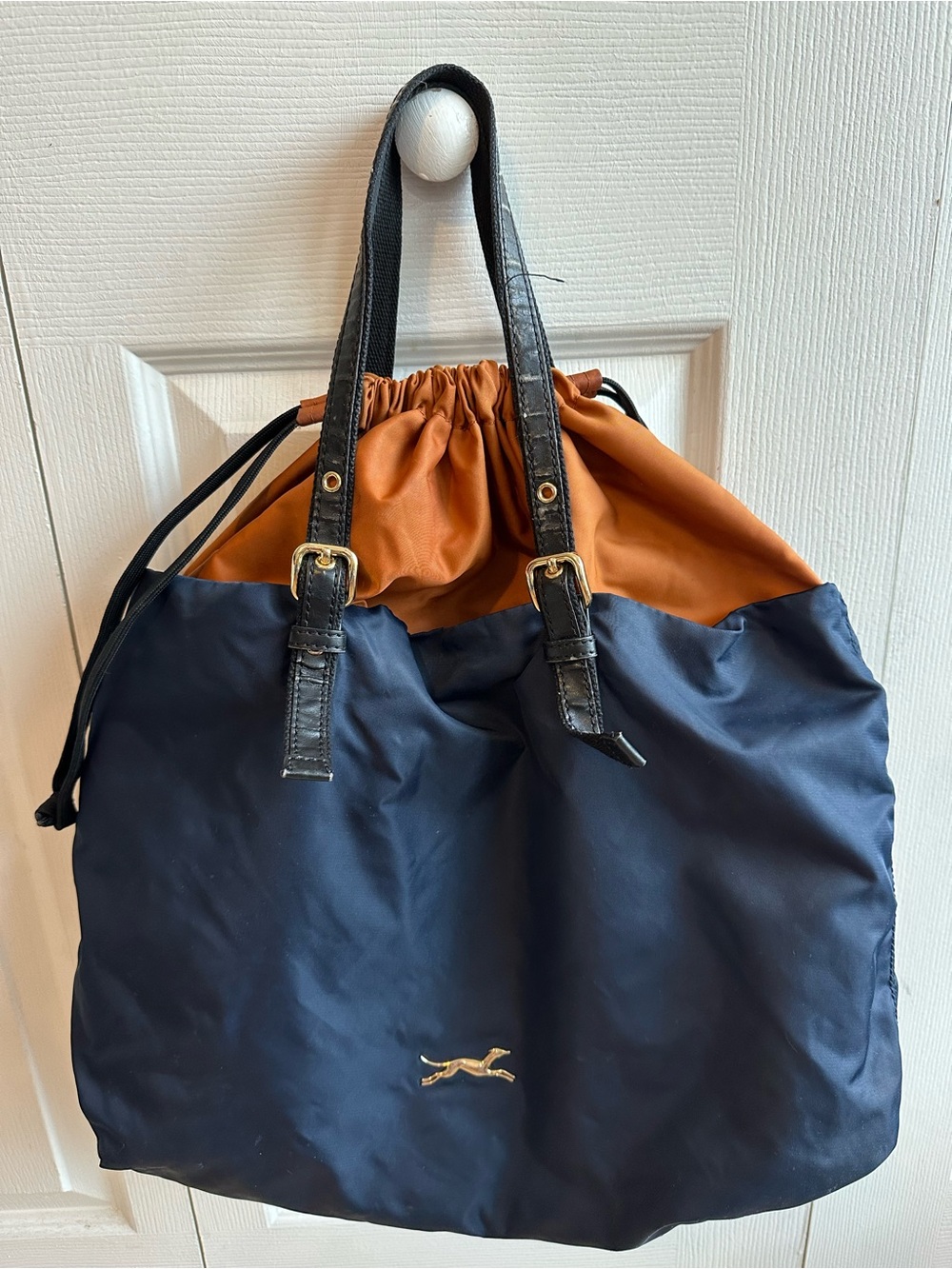 Bimba y Lola Two-Tone Navy and Cognac/Orange Drawstring Shoulder Tote Bag